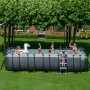 Rechteckiger Exit Black Leather Pool 540x250 mit Sandfilterpumpe und Poolleiter im Garten.