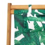 Detailansicht: Klappbarer Strandstuhl aus Eukalyptusholz mit Blattmuster und Kissen.