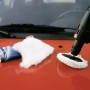 LUX Polierhaube 125 mm mit Bohrmaschine und Politur auf rotem Autolack.