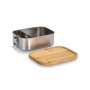 Offene Edelstahl Lunchbox mit Bambusdeckel und Trennwand. Silberne Vorratsdose mit Clipverschluss.