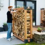Westmann Lärchenholz Kaminholzregal Michel XXL FSC® mit Holzscheiten im Garten.