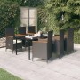 Schwarze 7-tlg. vidaXL Garten-Essgruppe mit Rattanstühlen, Tisch und cremefarbenen Kissen.