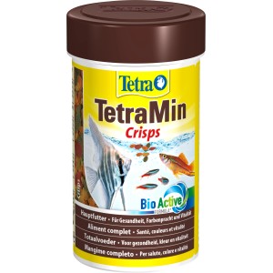 TetraMin Crisps 100ml Fischfutter für Zierfische im gelben Behälter mit braunem Deckel.