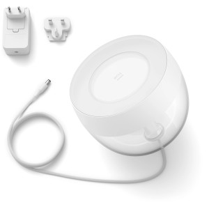 Weiße Philips Hue Iris Tischleuchte mit Zubehör für farbige Akzente & smarte Steuerung.
