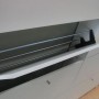 Weißer ebuy24 Escape Schuhschrank mit 4 Klappen und Schuhhalterung.
