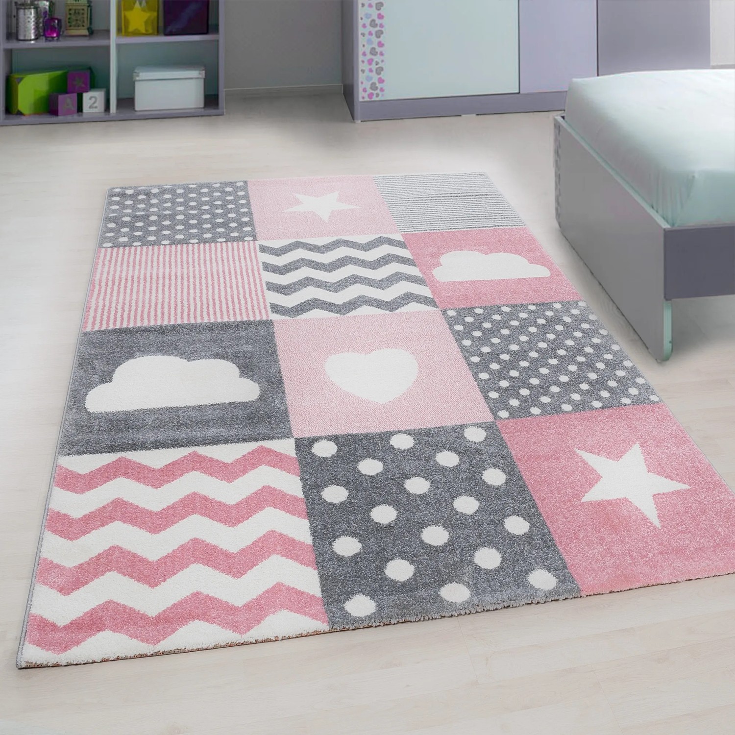 Ayyildiz Kinderteppich Kids 620 Pink mit Mustern wie Sterne, Wolken und Herzen.
