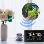 Echos Eco-450 Funkwetterstation mit Farbdisplay und Außensensor auf Tisch.