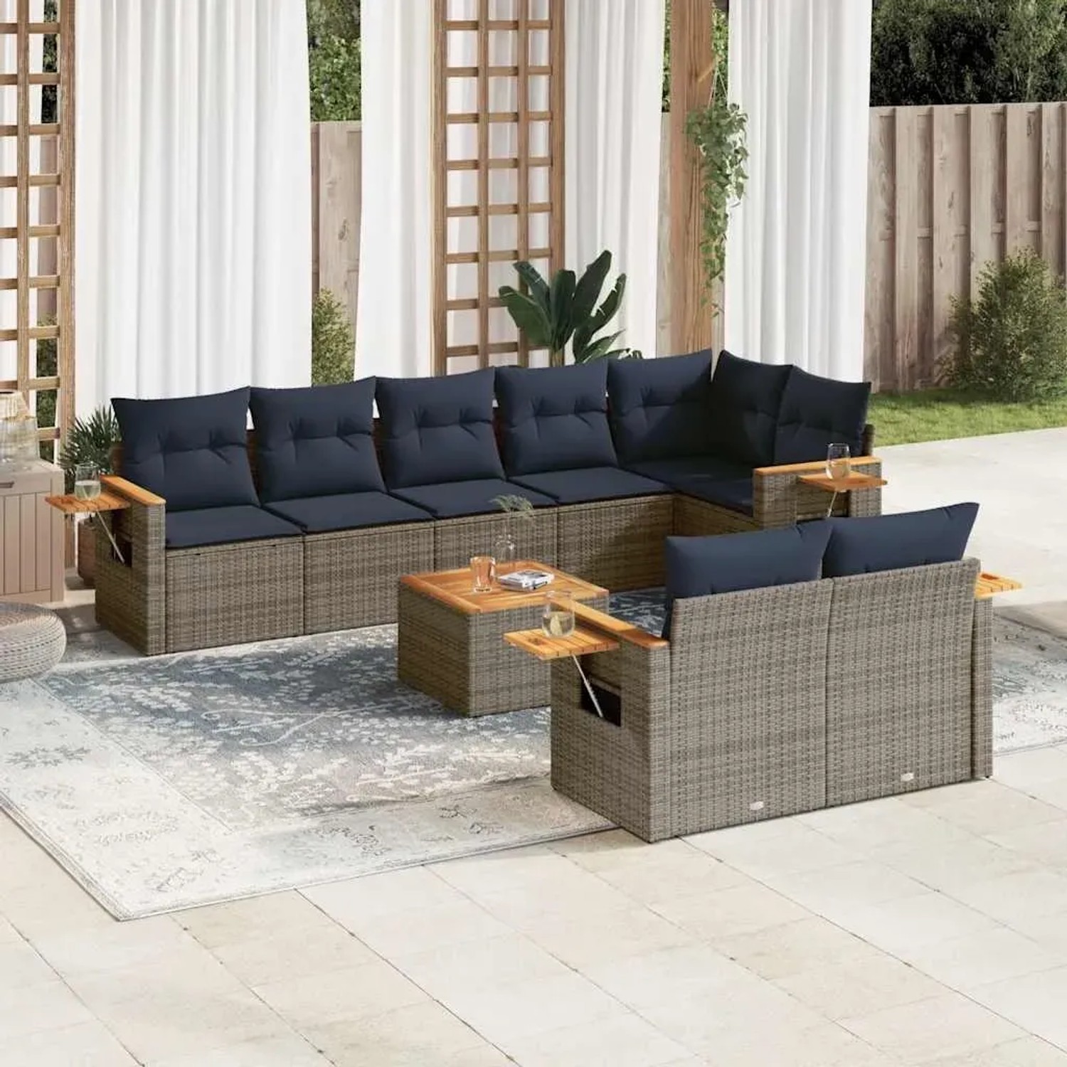 Graue 9-tlg. vidaXL Garten-Sofagarnitur aus Rattan mit marineblauen Kissen und Akazientisch.