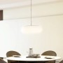 Weiße LED Smart Home Pendelleuchte mit Leselampe über Esstisch, dimmbar.