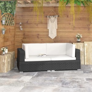 Schwarzes vidaXL Ecksofa 2er-Set aus Polyrattan mit creme Auflagen im Garten.