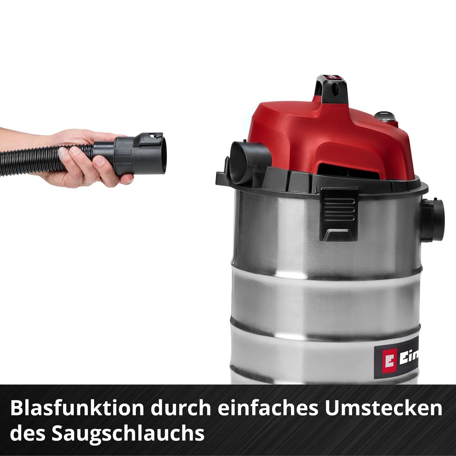 Einhell Nass-Trockensauger TC-VC 3055 S: Hand steckt Saugschlauch für Blasfunktion in rotes Gerät.