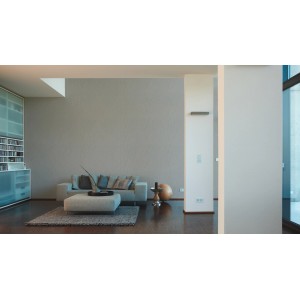 Wohnraum mit grauer Vliestapete Spot 2 Uni von OBI an der Wand.