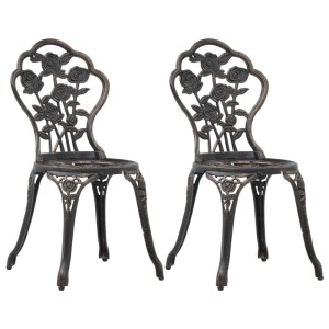 Zwei bronzefarbene Furnicato Bistro-Stühle aus Aluminiumguss mit Blumenmuster.