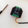 Shelly Sensorschnittstelle Plus Add-on in Schwarz mit Temperaturfühler für Hausautomation.