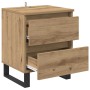 Nachttisch Artisan-Eiche aus Holzwerkstoff mit zwei Schubladen und schwarzen Metallfüßen, eine Schublade offen.