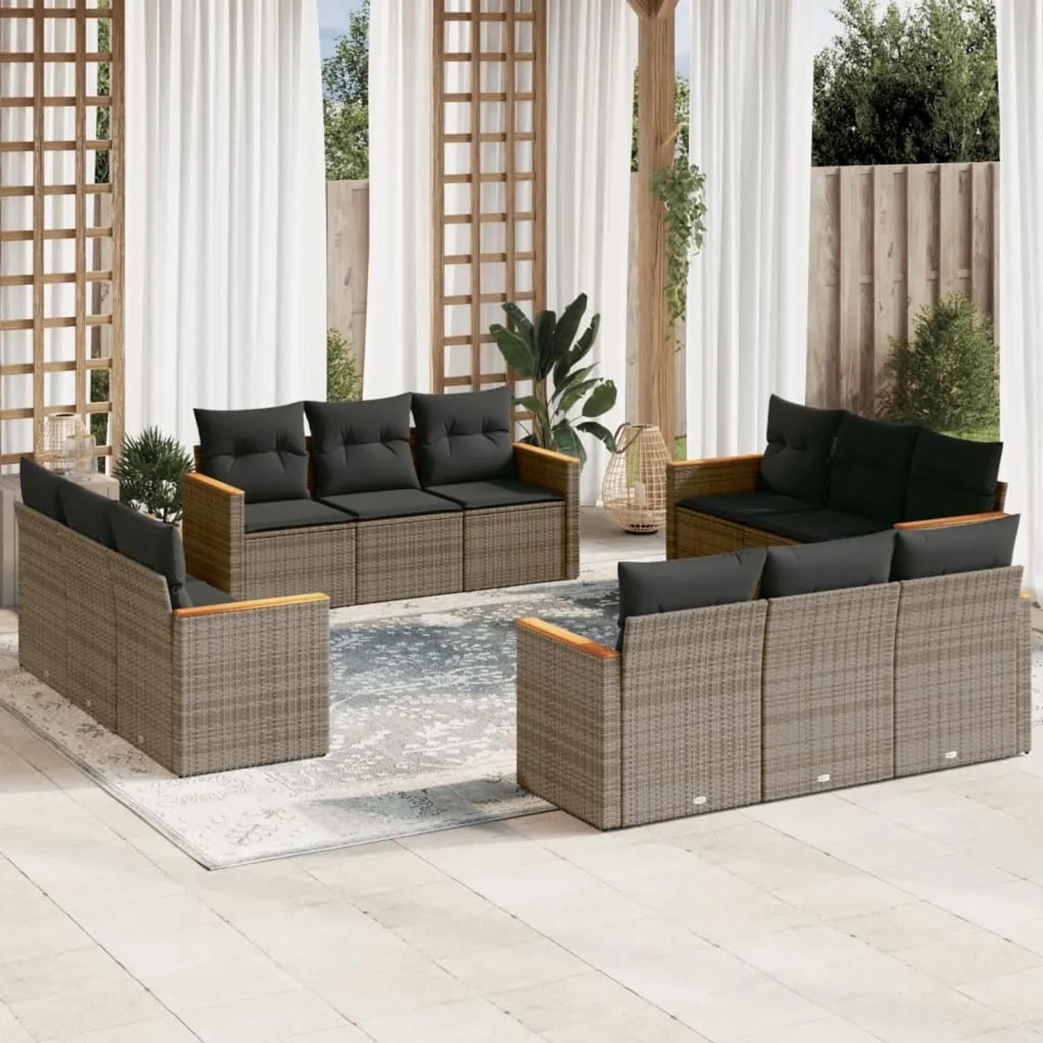 Graue 12-tlg. vidaXL Garten-Sofagarnitur aus Polyrattan mit Kissen auf einer Terrasse.