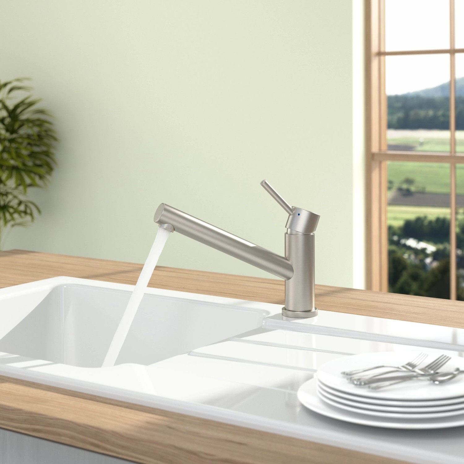 Villeroy & Boch Como Küchenarmatur aus Edelstahl mit Wasserstrahl in weißem Spülbecken.