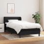 Schwarzes vidaXL Boxspringbett 100x200 cm mit Matratze und Kopfteil.