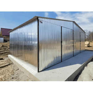 Liderstal Metallgarage Basic aus verzinktem Blech mit zwei Doppeltoren und Giebeldach auf Betonfundament.