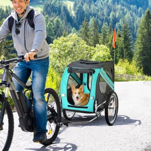 Fahrradanhänger für Hunde von PawHut, türkis und schwarz, mit Hund. Sicherer Transport für Kleintiere.