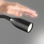 Schwarzer Fischer & Honsel LED-Wandspot Sten, flexible Leselampe mit Gestensteuerung.