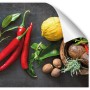 Myspotti Küchenrückwandfolie Fresh Spice mit Chili, Zitrone und Gewürzen.