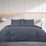 Anthrazitfarbenes Baumwoll-Bettwäsche-Set auf einem Bett im modernen Schlafzimmer. Inkl. Decken- und Kissenbezüge.