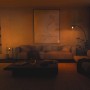 Gemütliches Wohnzimmer mit warmweißem Philips Hue E14 Kerzenform Leuchtmittel für stimmungsvolle Beleuchtung.