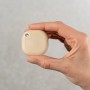 Beiger Shelly Blu Button Tough: Bluetooth-Taster für Hausautomation, robust und kompakt.