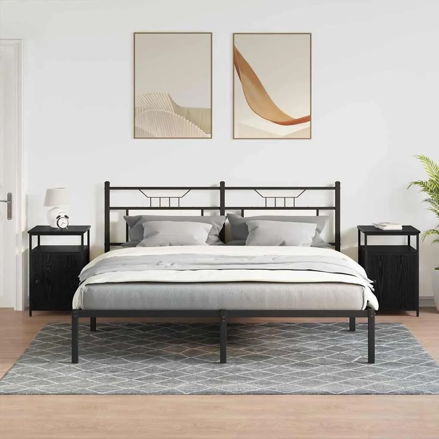 Schlafzimmer-Szene mit zwei schwarzen vidaXL Nachttischen in Eichen-Optik neben einem Bett.