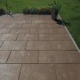Diephaus Terrassenplatten Finessa Marrone, 60x40 cm, verlegt auf einer Terrasse im Garten.