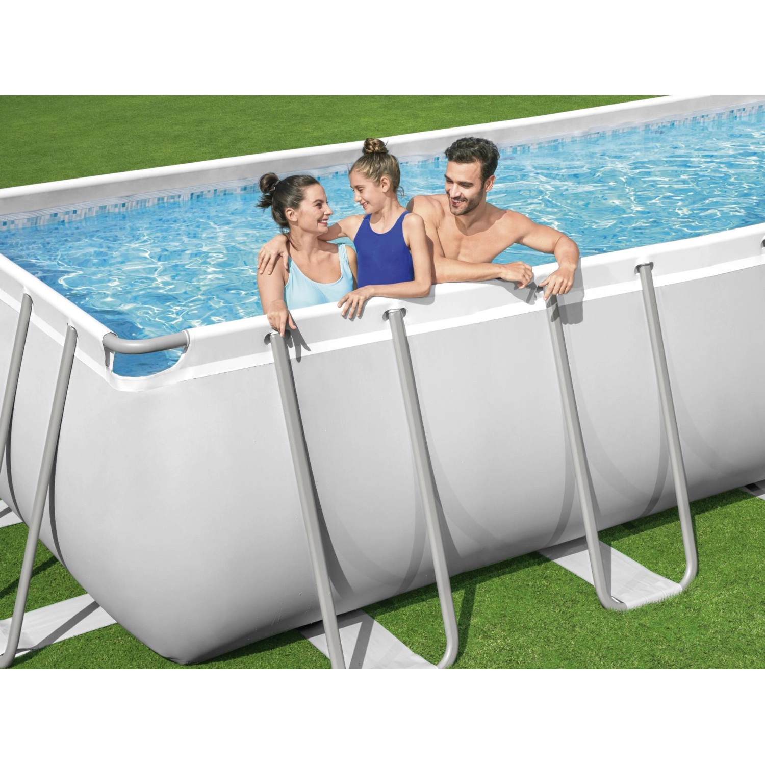 Bestway Stahlrahmenpool-Set Power Steel, rechteckig, mit Familie im Pool.