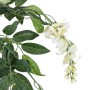 Detailaufnahme: Künstlicher Glyzinienbaum mit grünen Blättern und weißen Blüten.