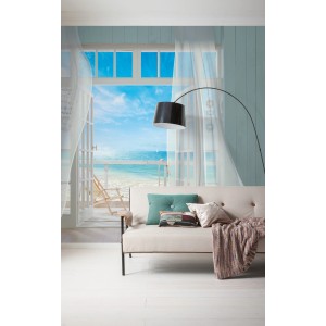 Komar Vlies Fototapete Malibu (300x250 cm) mit Strandmotiv im Wohnraum.