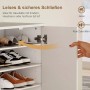 Weiße HOMCOM Schuhkommode mit Soft-Close-Scharnieren, die ein leises Schließen der Tür über den Schuhregalen zeigen.