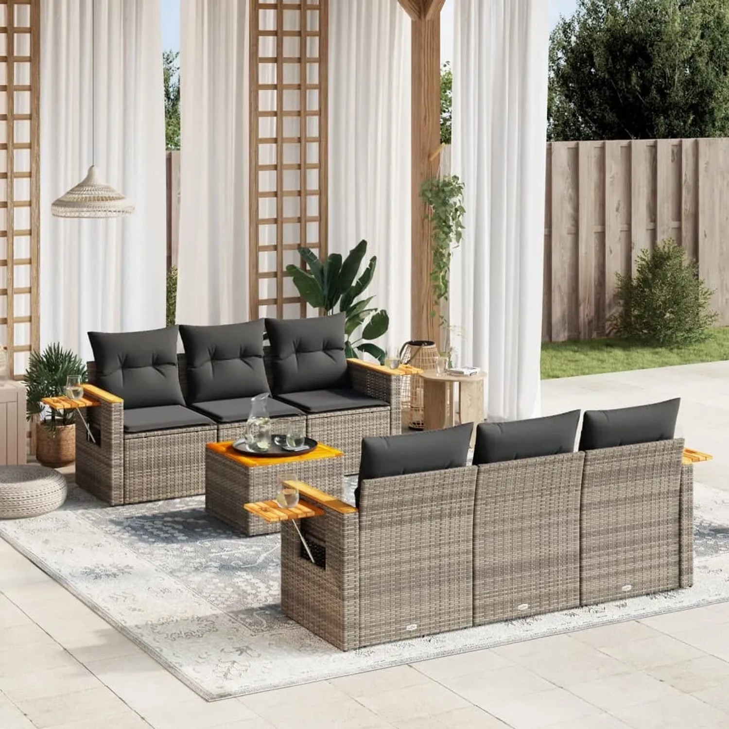 Graue 7-teilige vidaXL Garten-Sofagarnitur aus Polyrattan mit Kissen und Beistelltischen.