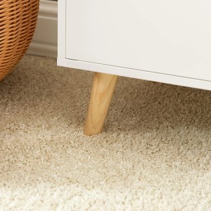 Detailaufnahme: Weißes SoBuy Kinderregal mit Holzfuß auf Teppich.