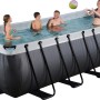 Exit Black Leather Pool: Rechteckiger Stahlrahmenpool mit Personen im Wasser.