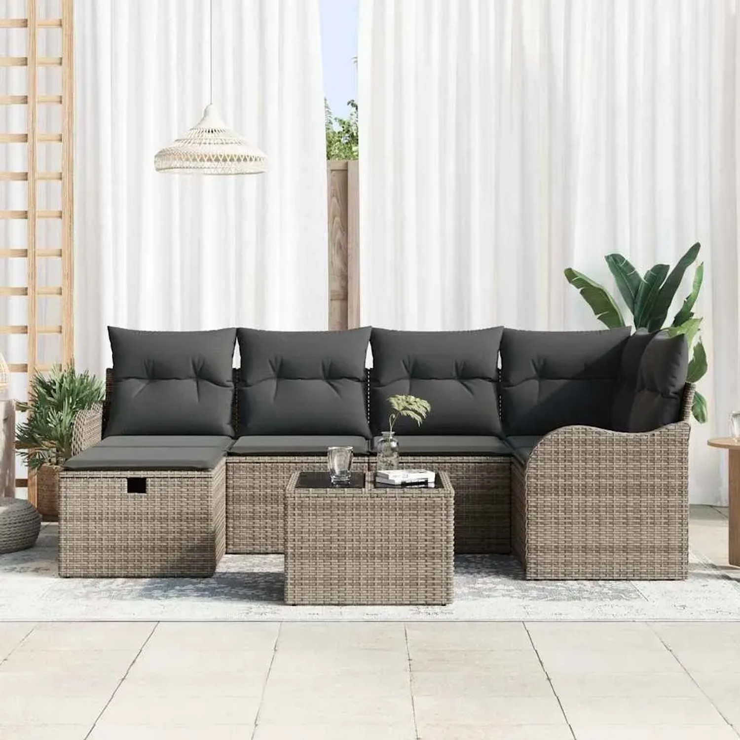 Graues 7-teiliges vidaXL Garten-Sofa-Set aus Polyrattan mit Kissen und Stauraum.
