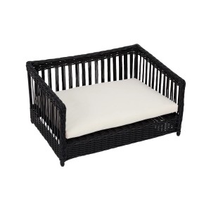 Schwarzes Rattan Hundebett 'Clotho' mit wasserdichtem Kissen, ideal für kleine bis mittelgroße Hunde.