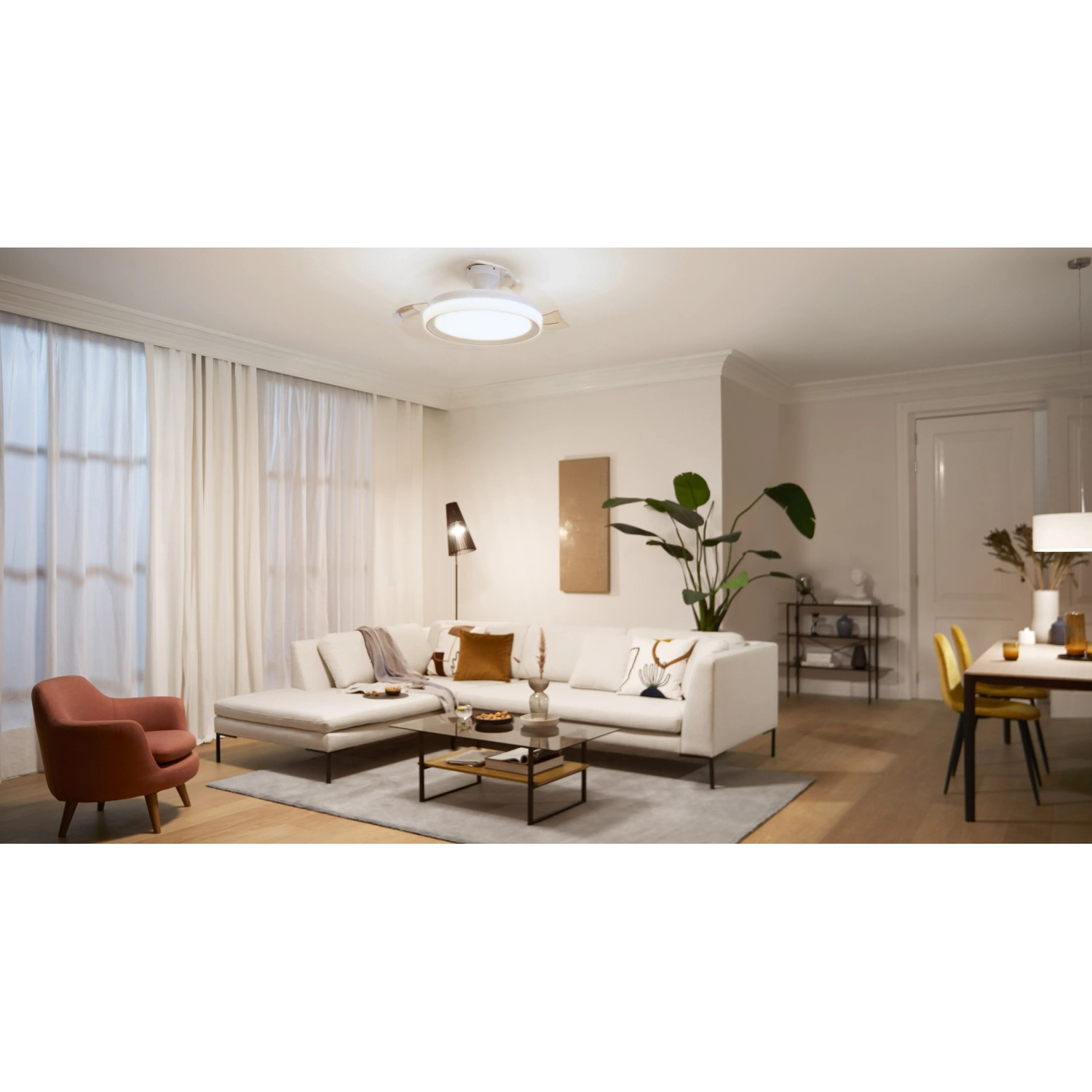 Weiße Philips LED Deckenleuchte Bliss mit Ventilator (Ø 106 cm) im Wohnraum.