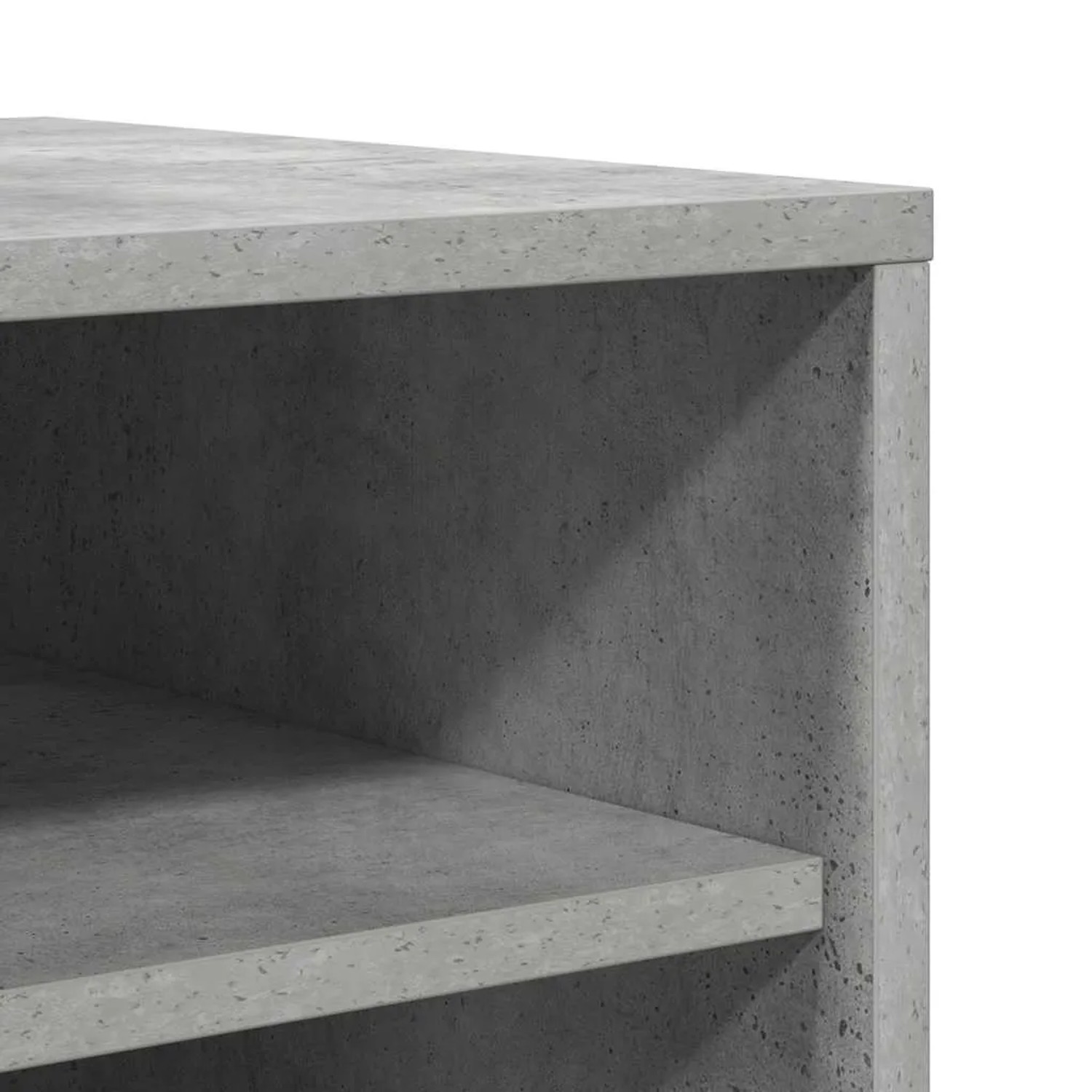 Detailansicht des betongrauen Schuhschranks aus Holzwerkstoff. Zeigt die Oberfläche und ein Innenregal.