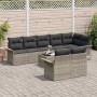 9-teiliges Gartensofa-Set aus grauem Poly Rattan mit Kissen.