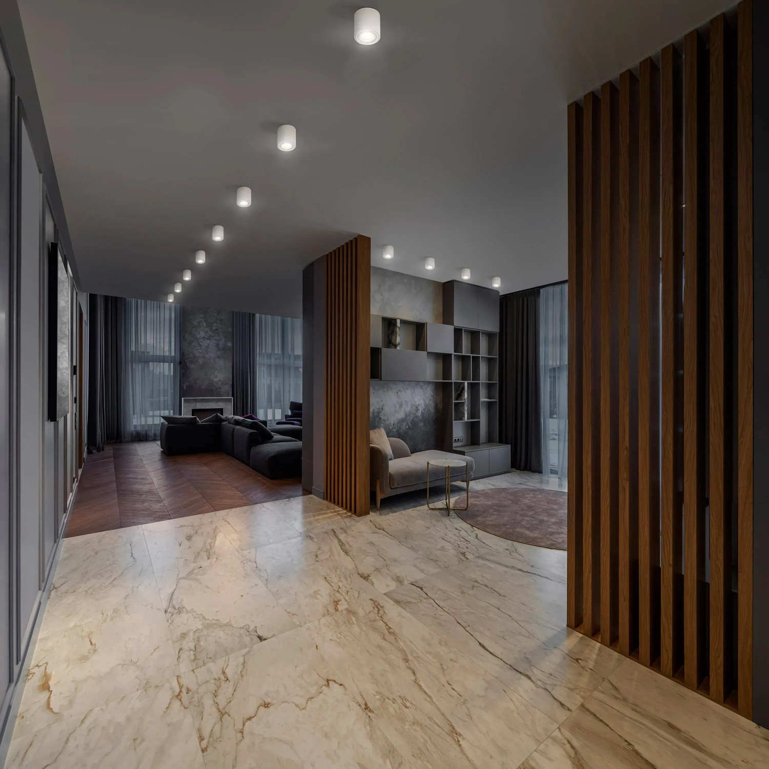 Weiße Ledvance Spots beleuchten modern Wohnzimmer mit Marmorboden und Holzelementen.