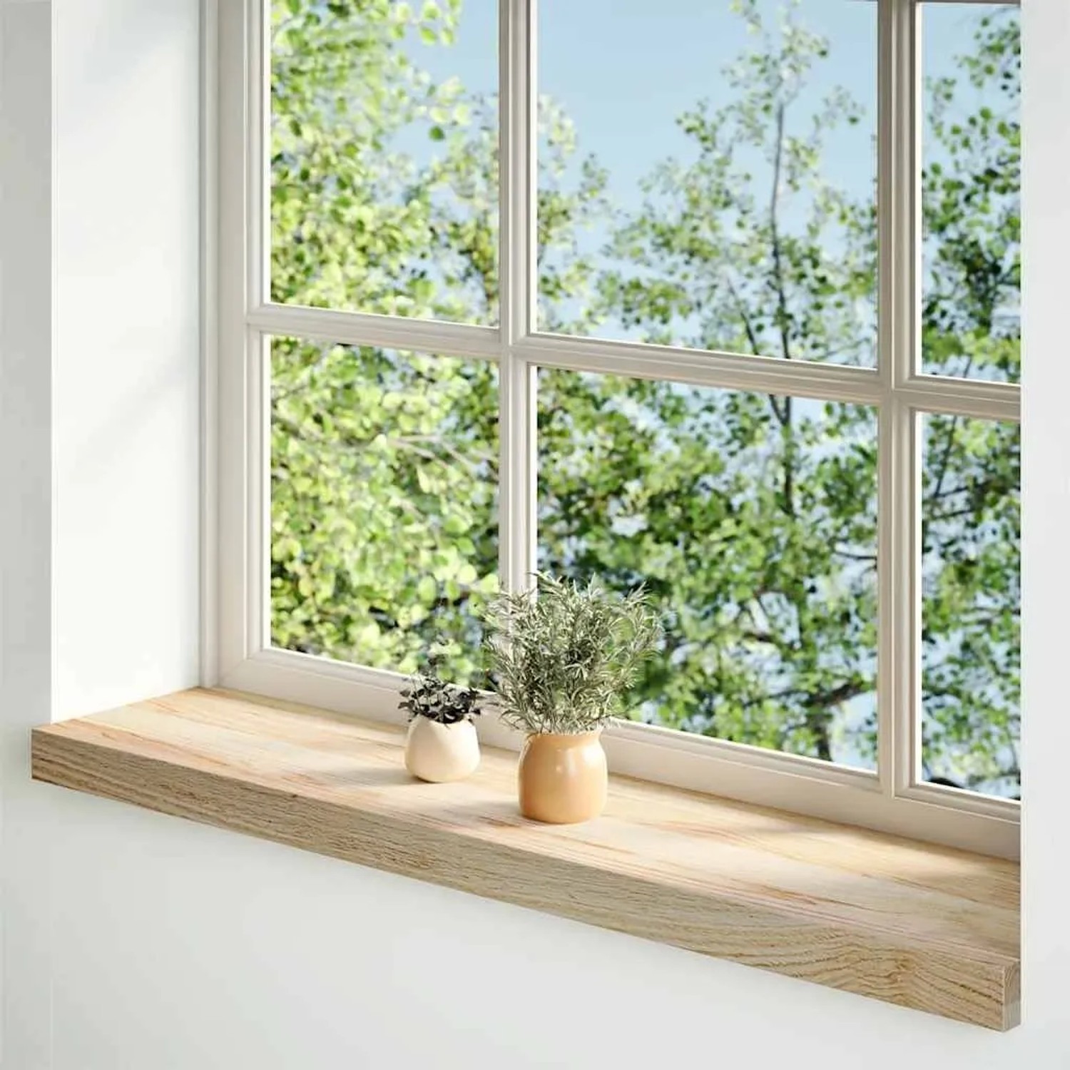 Zwei unbehandelte Eiche Massivholz Fensterbänke (80x20x2 cm) mit Deko auf einem Fensterbrett.