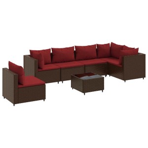Braunes 7-teiliges Garten-Lounge-Set aus Polyrattan mit roten Kissen und Tisch.