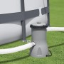 Bestway 800 gal Pool Filterpumpe neben Pool mit Schläuchen auf Rasen.