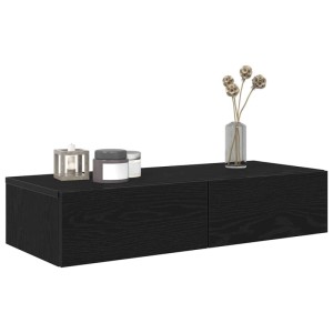 Schwarzes vidaXL Wandregal mit zwei Schubladen aus Holzwerkstoff, dekoriert mit Kerze und Vase.