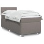 Boxspringbett Taupe 90x200 cm mit Matratze und weißer Bettwäsche.