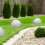 3er Set Globo LED-Solarleuchten in Steinoptik, grau, aus Kunststoff für den Garten.